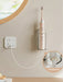 Wall‑Mounted Electric Toothbrush Holder — Clear Plastic Storage Rack