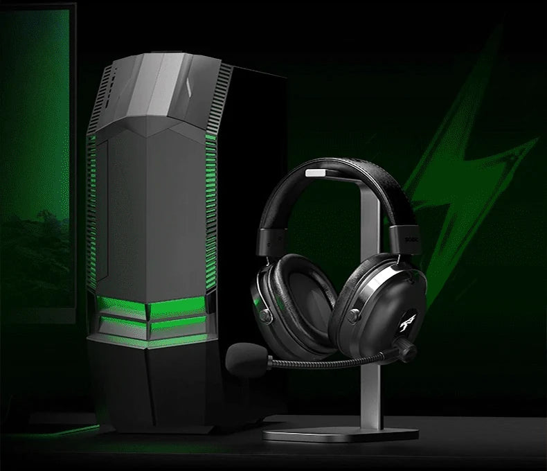 Commander headset on a stand beside a desktop computer
